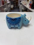 Charming blue ceramic rhinoceros planter
