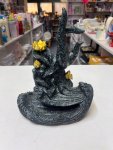 Dark, speckled resin decorative showpiece