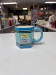 Light-blue hexagonal ceramic teacher's mug